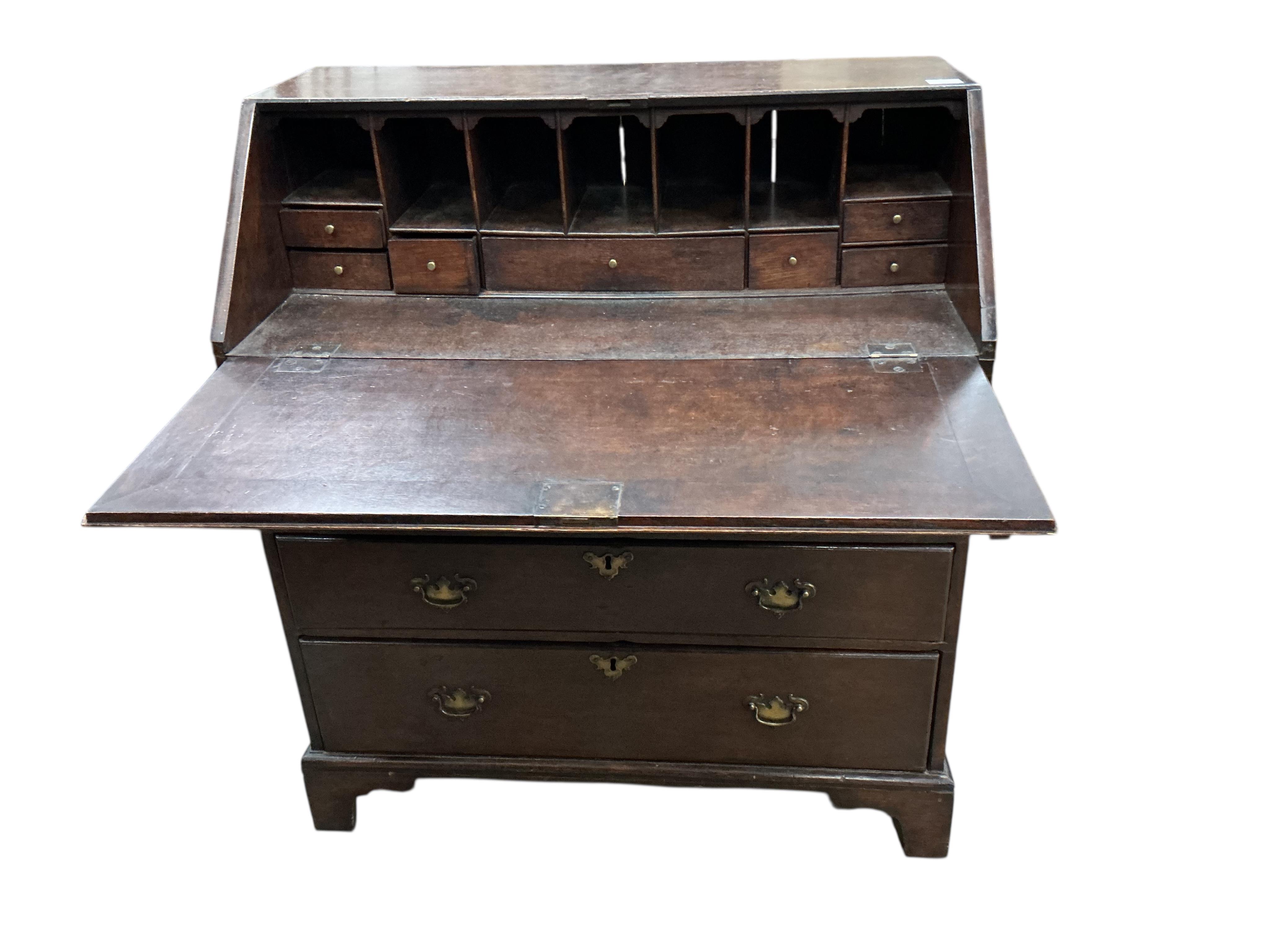 A George III oak bureau, width 91cm, depth 51cm, height 103cm